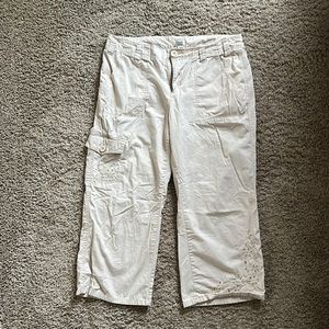 Women’s tan Capri pants with flower detail